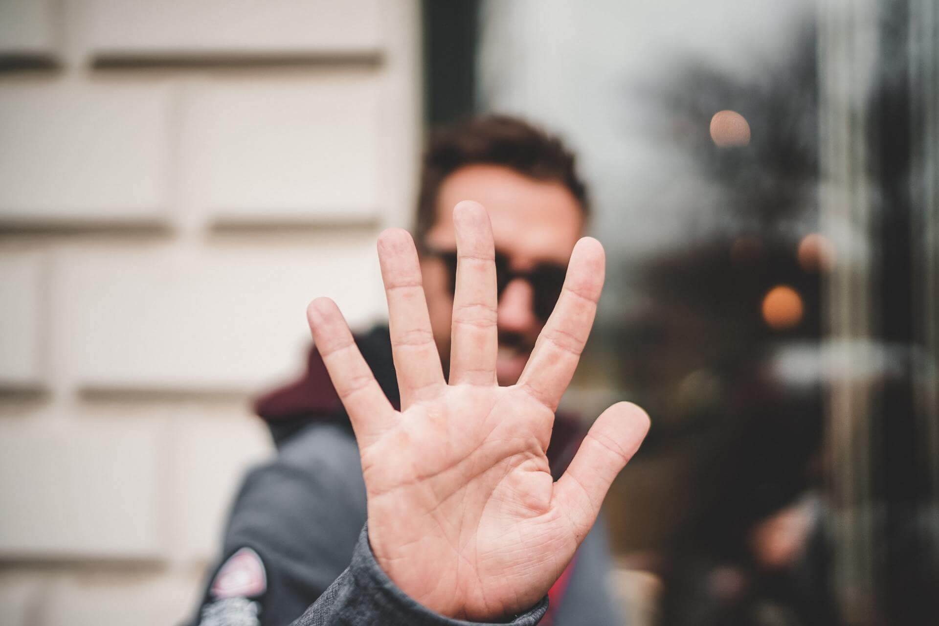 Photo Terminating an Offer Man's Hand Gesture Indicating STOP!